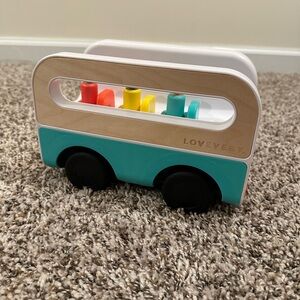 Lovevery Wheel Around Town Bus With Peg People from Realist Playkit Months 19-21